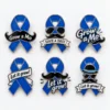 Six custom blue awareness ribbon enamel pins with black mustaches, sunglasses, hats, and slogans including “Grow a Mo,” “Save a Bro,” and “Let it grow!”